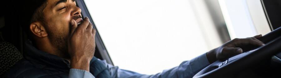 Drowsy man driving a truck